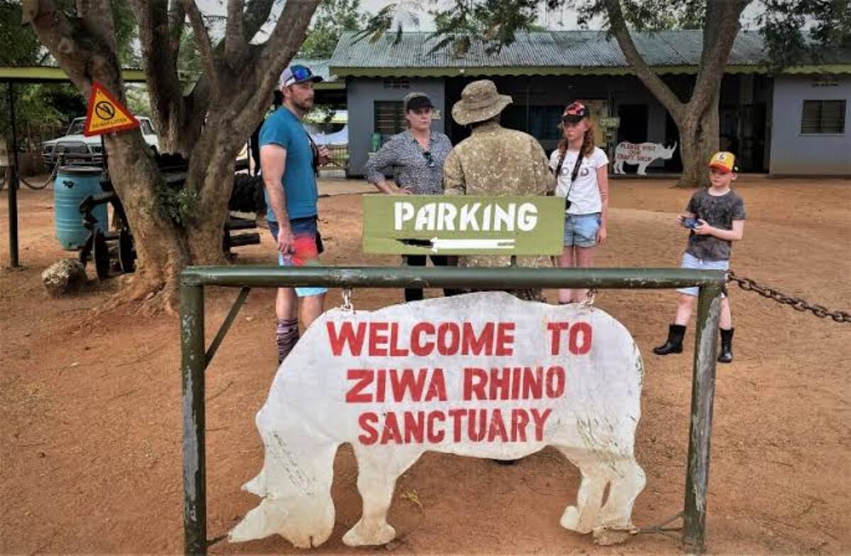 Visitors receiving a ranger briefing before setting out to track the rhinos.